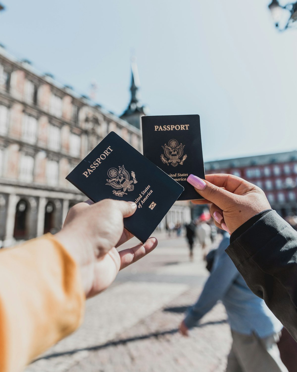 Person holding passports ready for a student visa application – student visa documents checklist